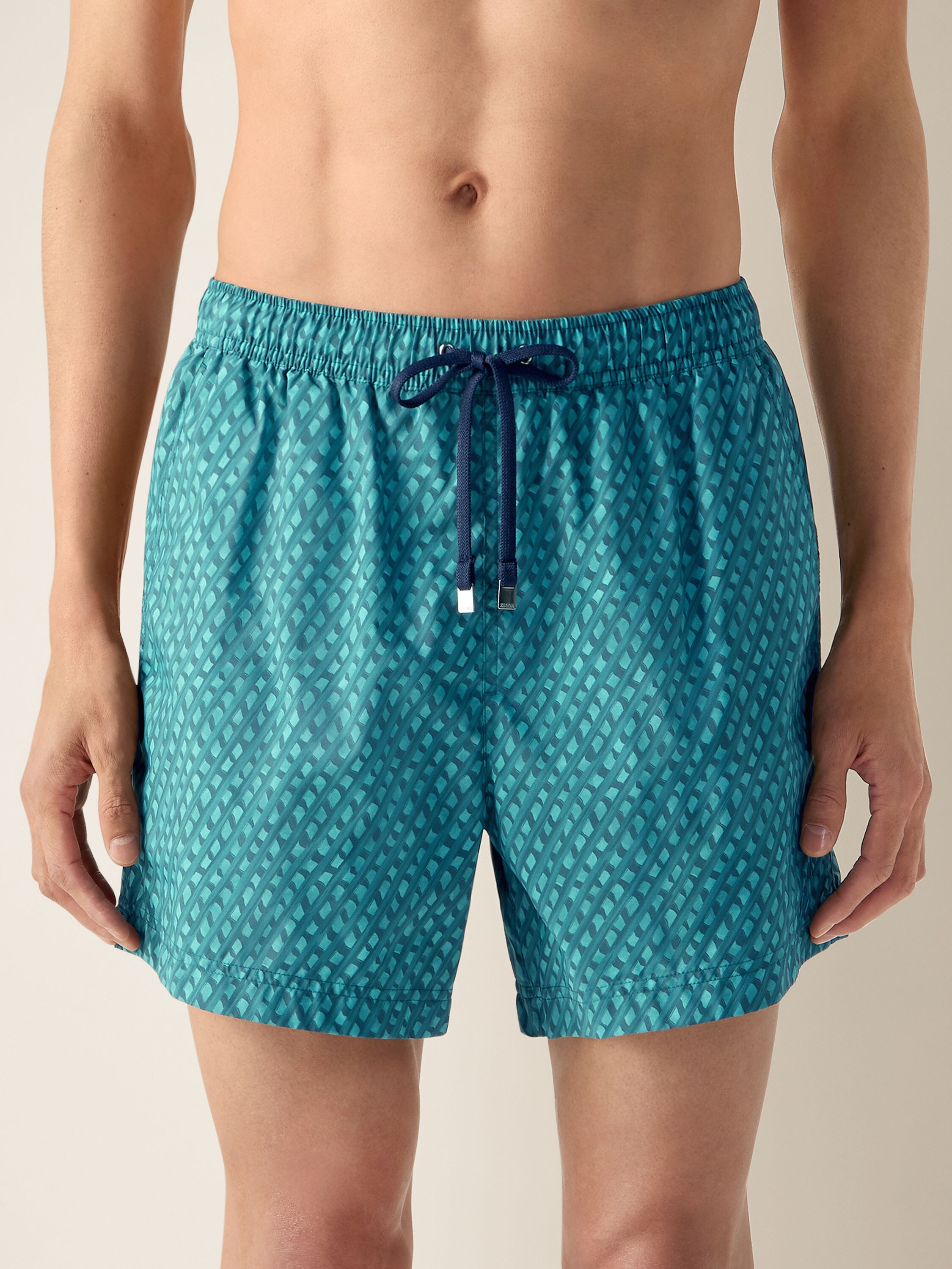 Swim Trunks mit Oasi-Netzprint Detailfoto #1 des Produkts