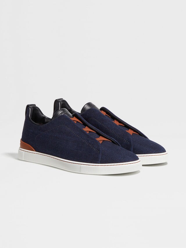 Triple Stitch™ Sneaker aus Baumwolldenim in Marineblau Hauptproduktfoto