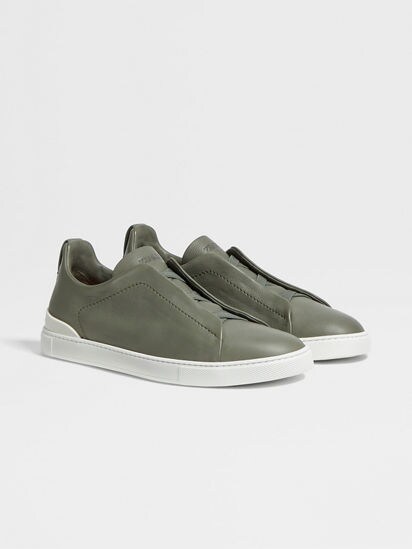 Army green clearance slip on sneakers