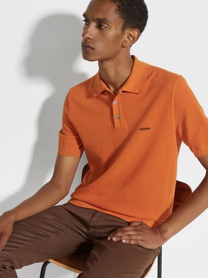 Bright orange polo shop